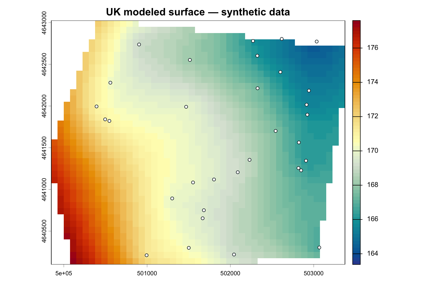 Universal-kriging surface shaded blue at lower synthetic heads and red at higher heads, with monitoring wells.